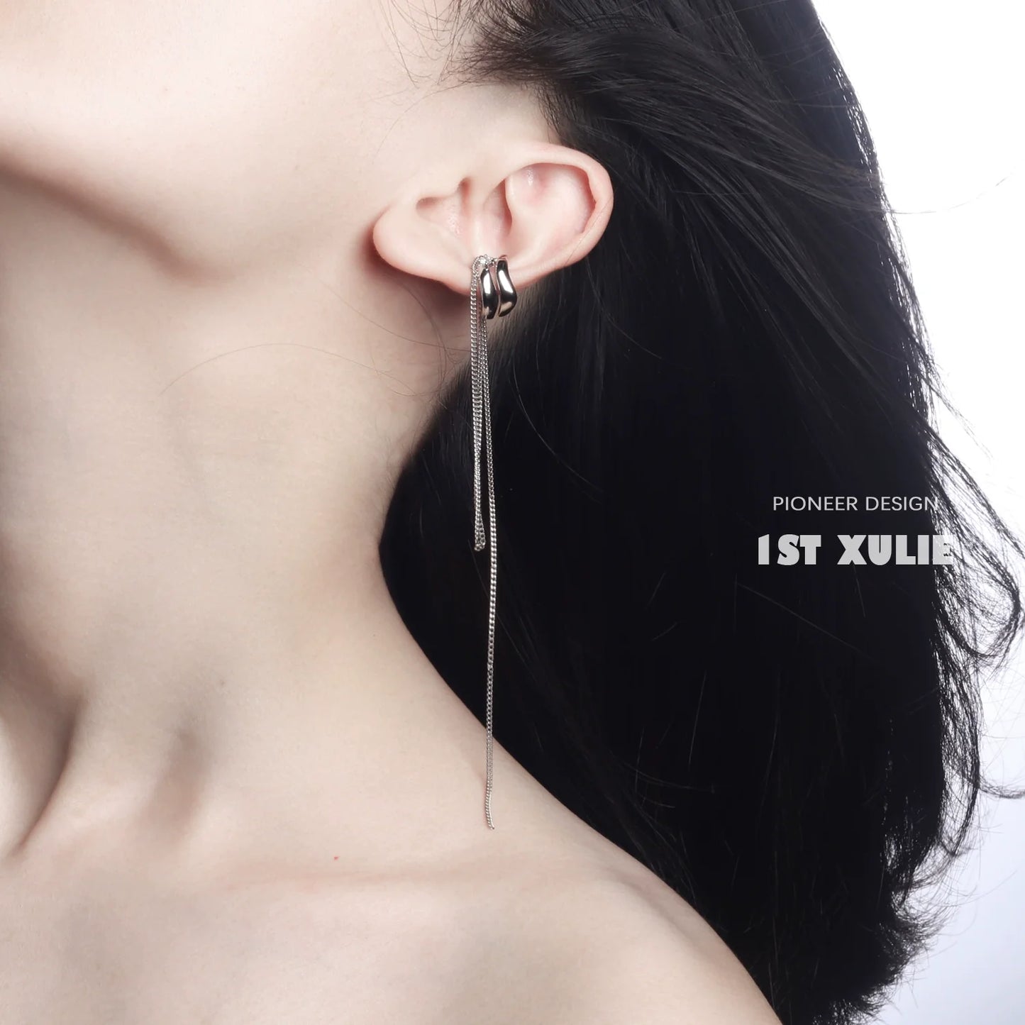 Fashionable punk tassel ear cuff in silver design, perfect for edgy style enthusiasts