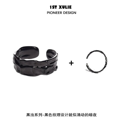 Y2K gothic couple rings in black metal design, featuring a unique twisted style for a trendy look