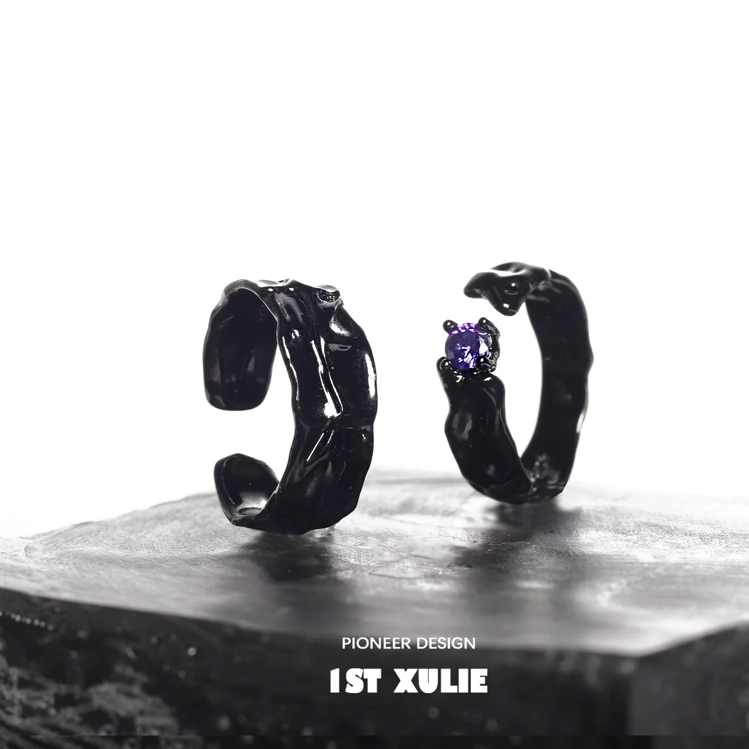 Y2K gothic couple rings in black with unique designs and a purple gemstone accent