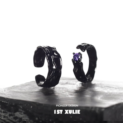 Y2K gothic couple rings in black with unique designs and a purple gemstone accent