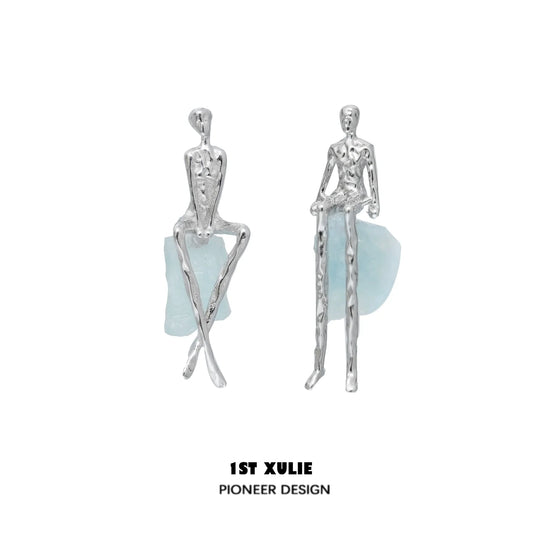 Y2K modern muse stud earrings featuring unique figurine designs with a silver finish