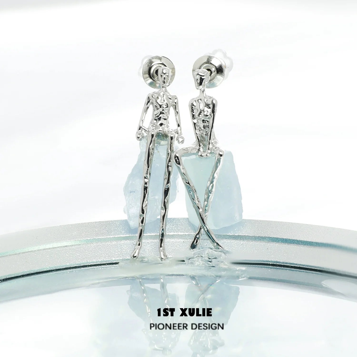 Y2K modern muse stud earrings in silver with unique human figure design for a trendy look