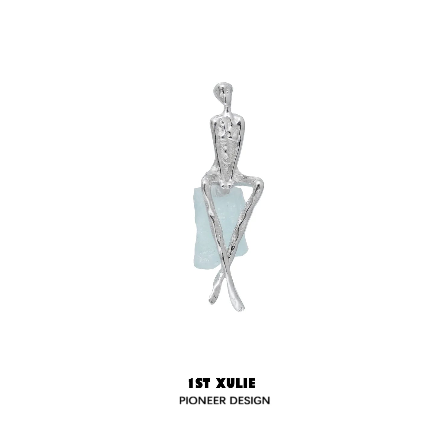 Y2K modern muse stud earrings featuring a unique design with silver-tone and aquamarine accents