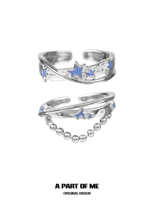 Silver planet chain ring featuring blue stars in a stylish design by A PART OF ME