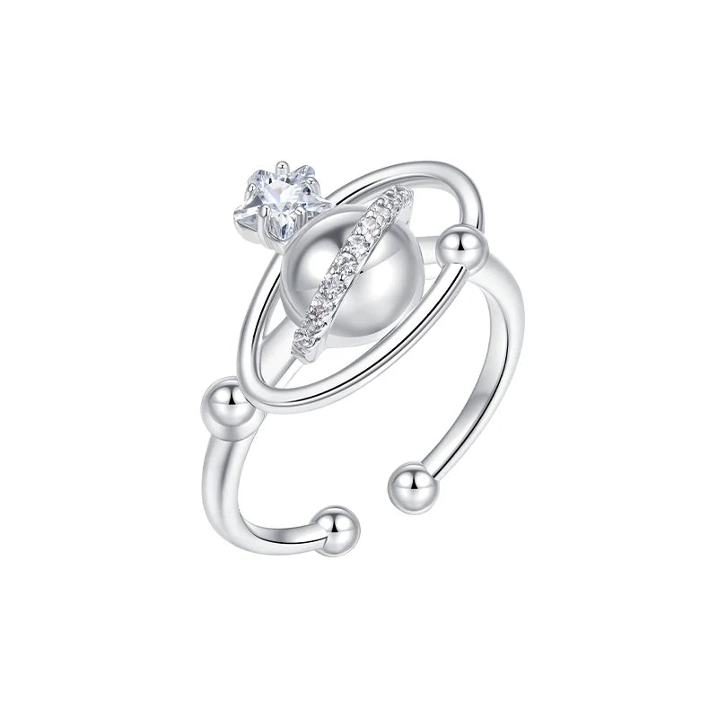 SUN HUNTER planet garden ring featuring a celestial design with sparkling gem and silver finish