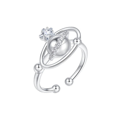SUN HUNTER planet garden ring featuring a celestial design with sparkling gem and silver finish