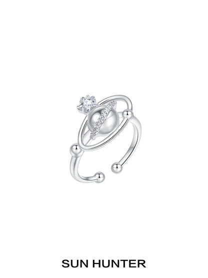 SUN HUNTER planet garden ring with sparkling gemstone and planetary design in silver tone