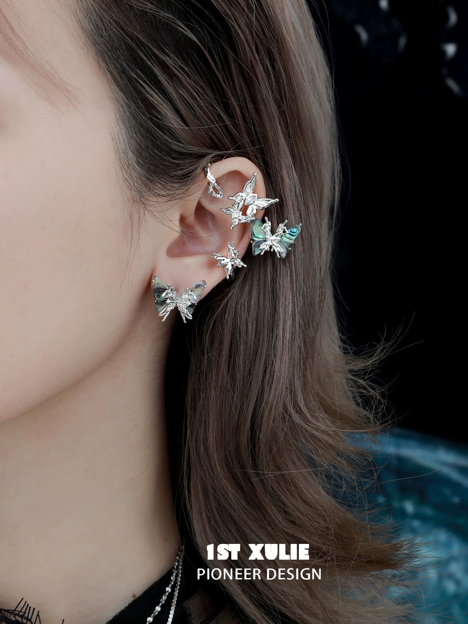 Punk butterfly ear clips showcasing a unique design with multiple butterfly accents for trendy ear jewelry