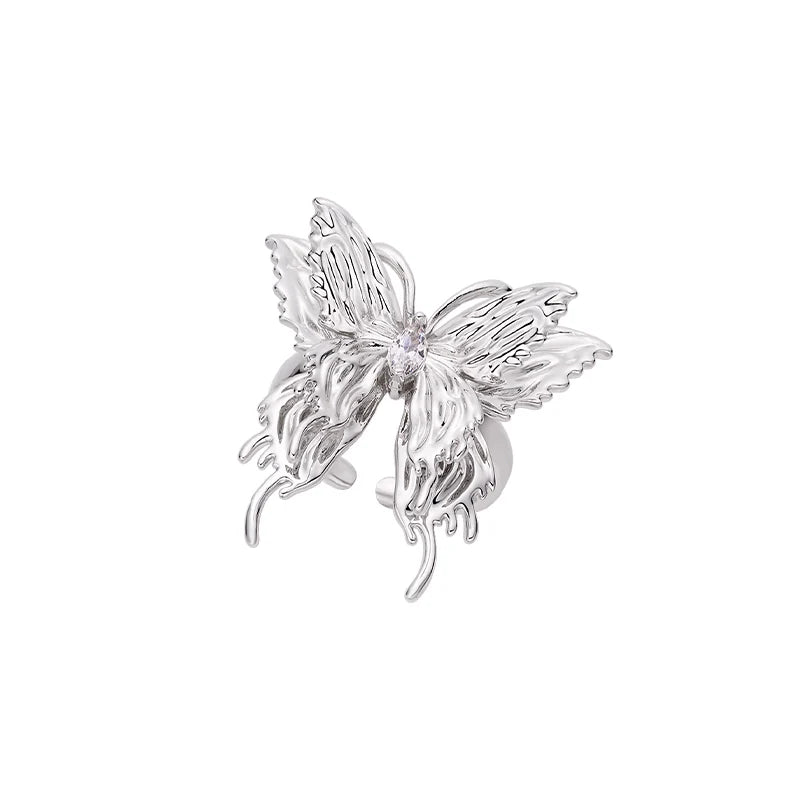 Stylish SUN HUNTER punk butterfly ear cuffs featuring intricate wing details and a sparkling center gem
