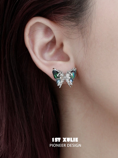 Punk butterfly earrings from 1ST XULIE featuring colorful designs and unique embellishments