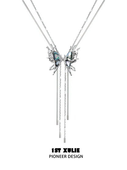 Punk butterfly necklace by 1ST XULIE featuring a unique design with colorful accents and silver chains