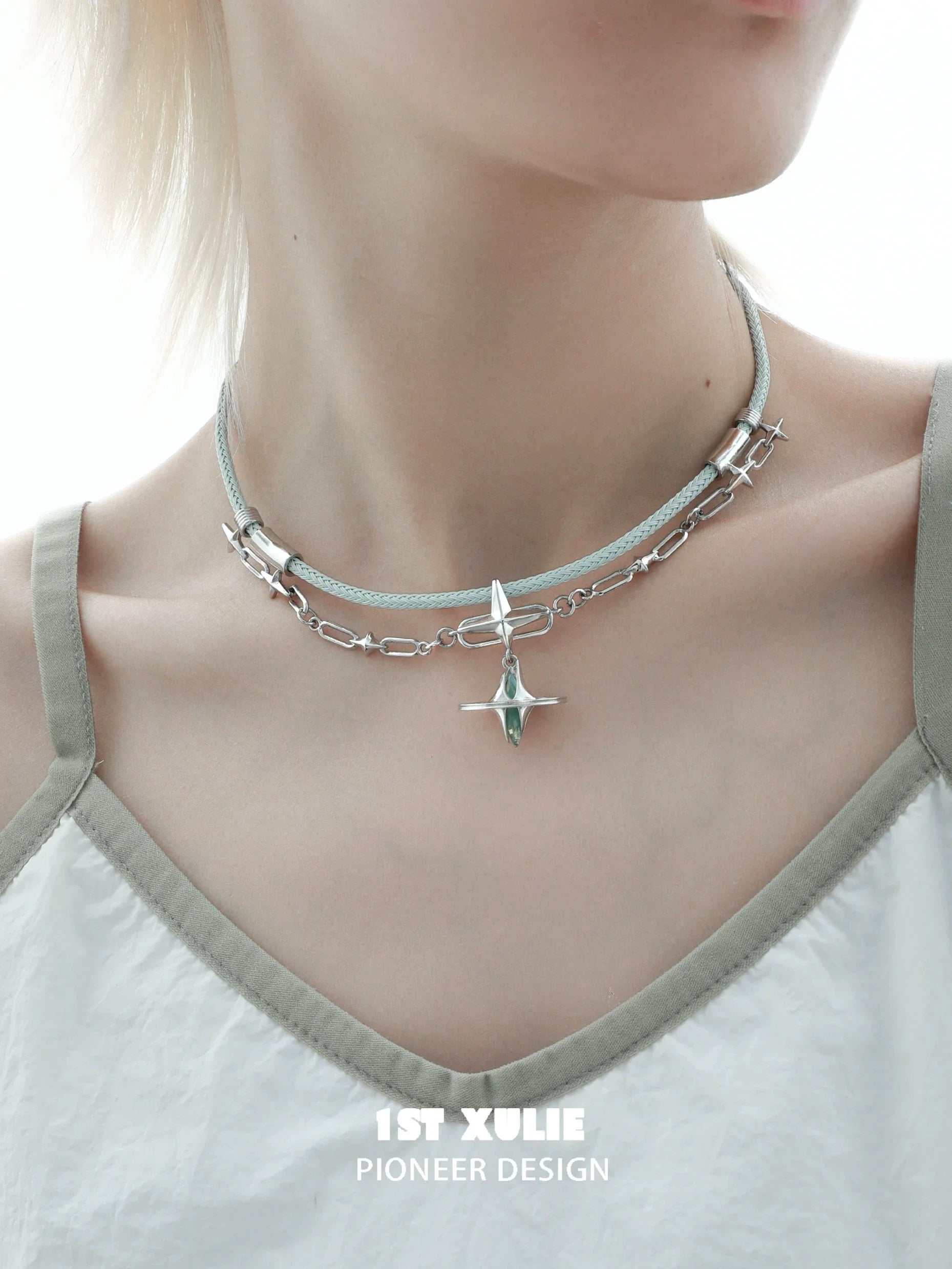 Layered punk dreamcore necklace featuring silver chains and a unique pendant design