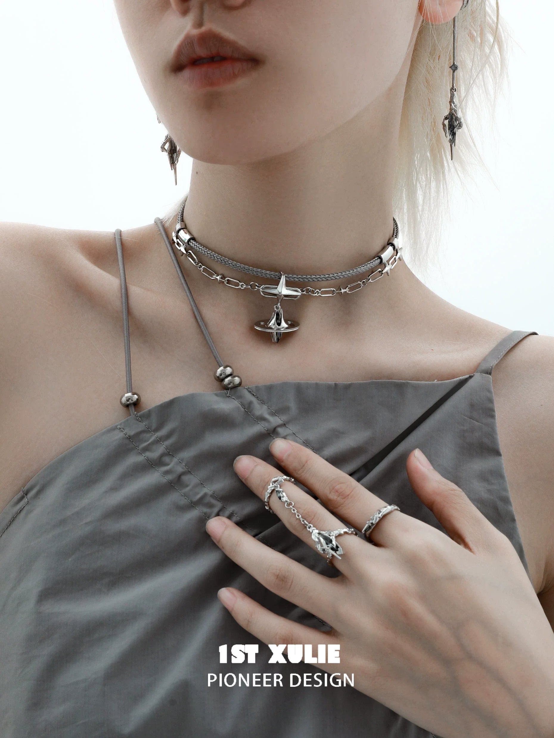 Punk dreamcore necklace layered with silver chains and unique pendants for a stylish, edgy look