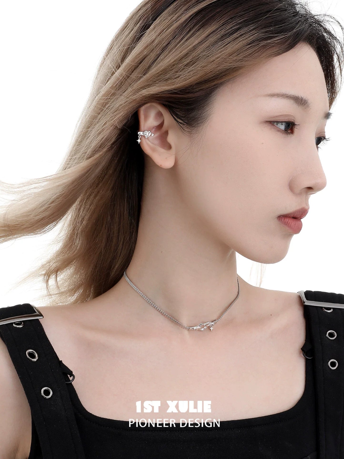 Model wearing a punk heart necklace in silver with a stylish outfit for a trendy look