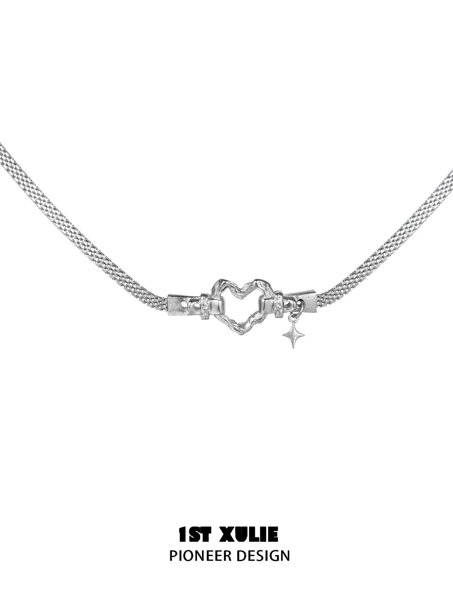 Silver punk heart necklace with a unique heart design and a star charm for stylish accessories