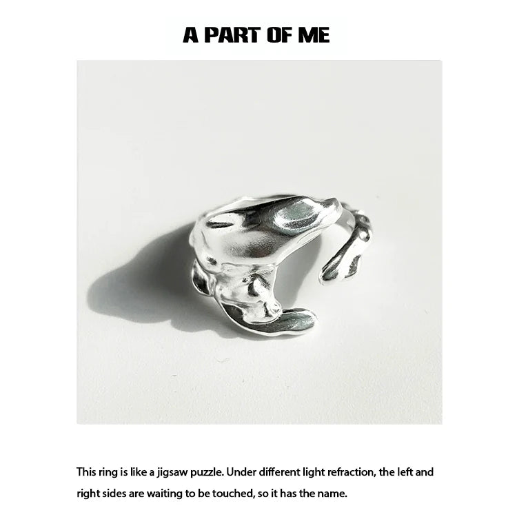 A PART OF ME imperfect puzzle punk ring designed with unique jigsaw puzzle curves and reflections