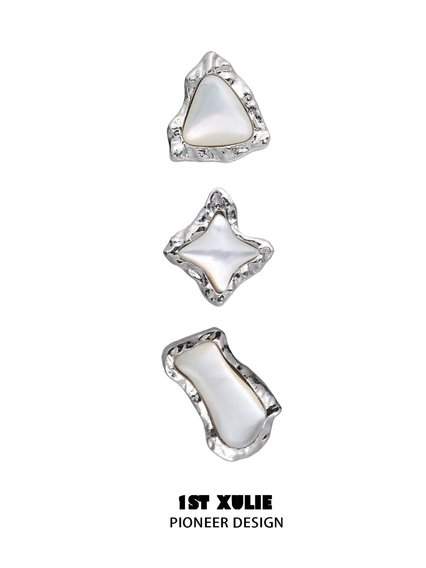 Punk moon fragment earrings in silver with unique organic shapes and glossy finish