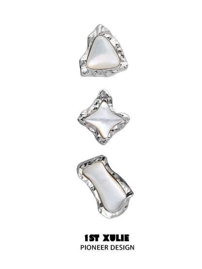 Punk moon fragment earrings in silver with unique organic shapes and glossy finish