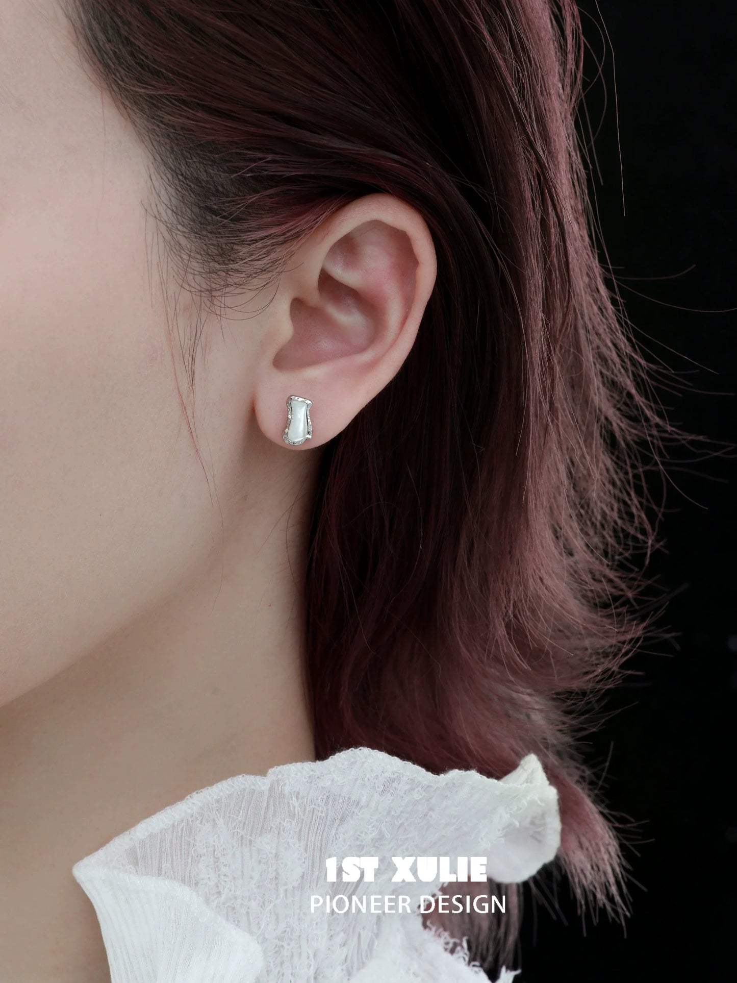 Stylish punk moon fragment earrings in silver, showcasing a unique design for modern fashion lovers