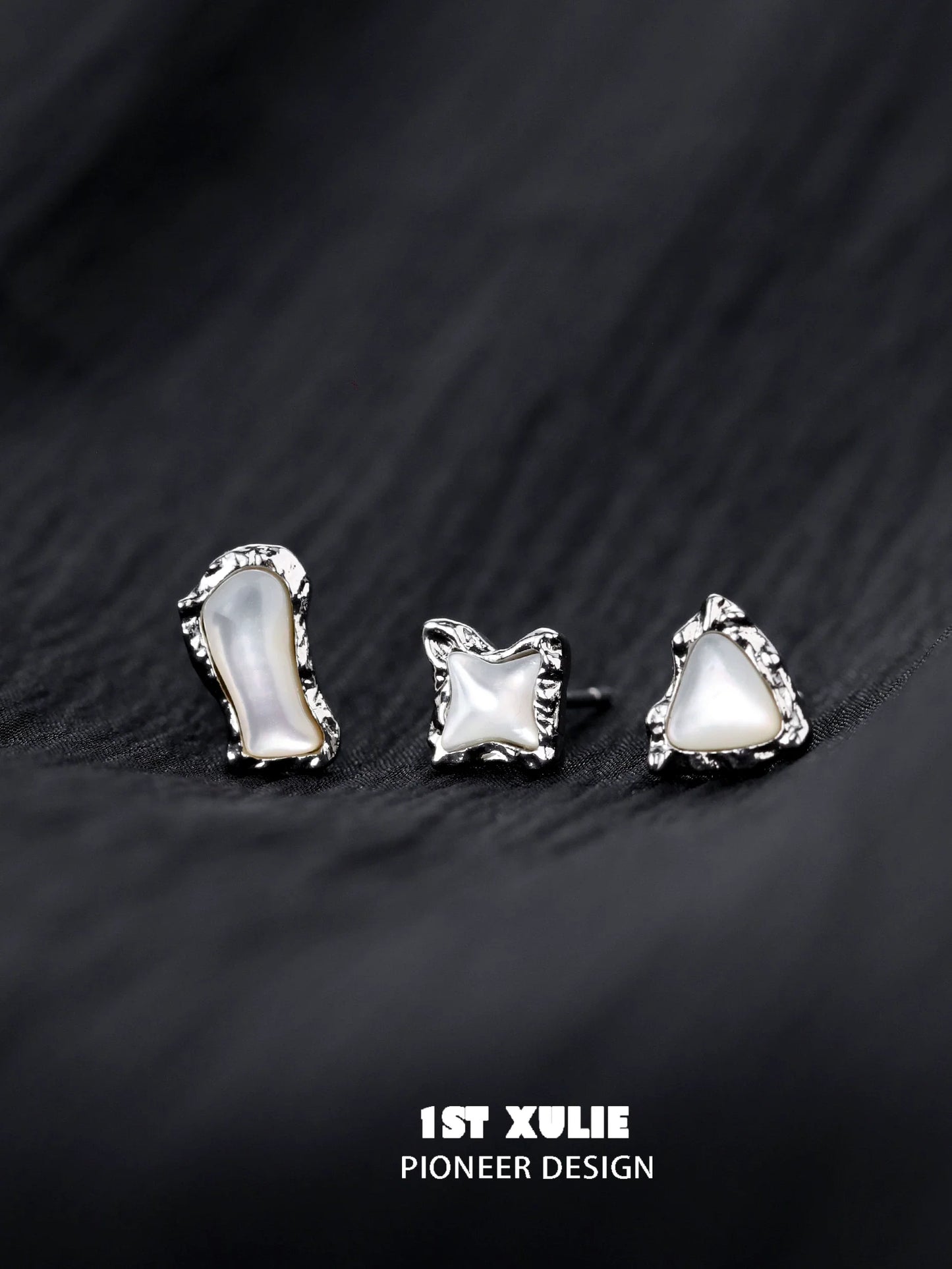 Three unique punk moon fragment earrings with a silver finish and irregular shapes