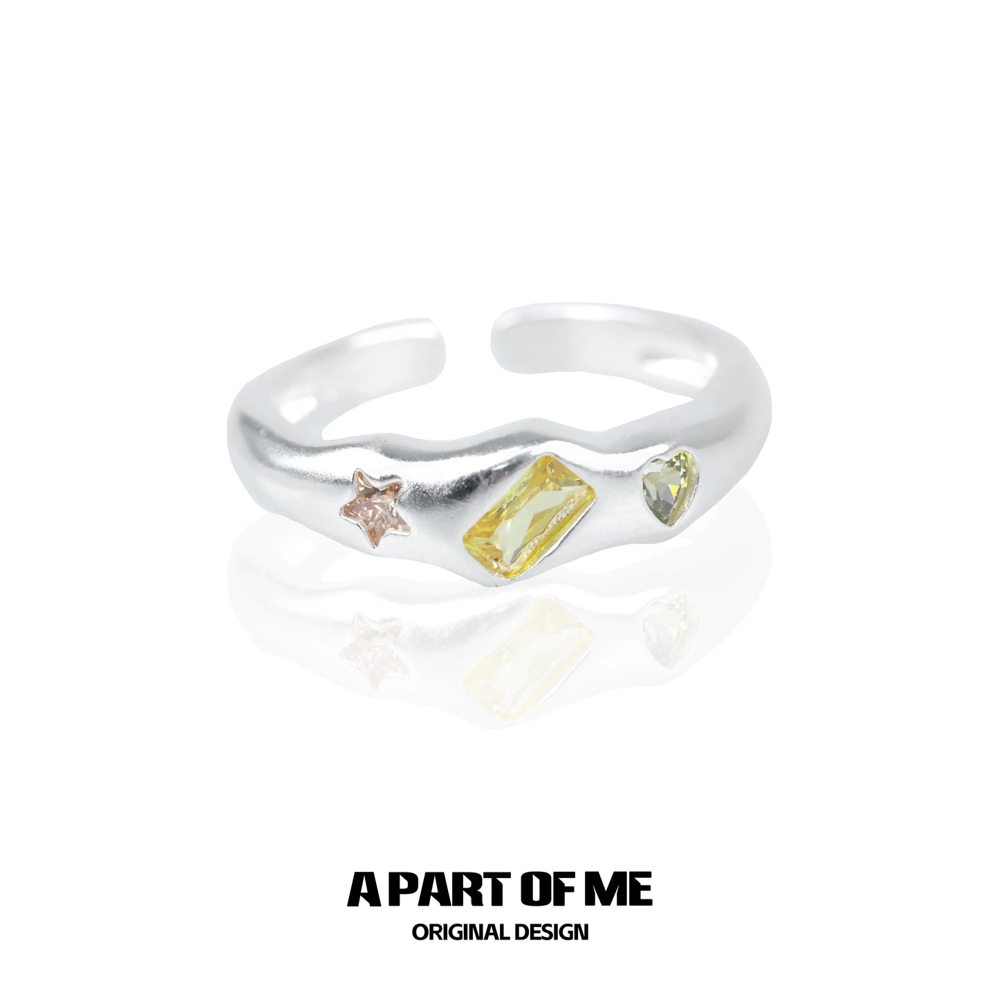 A PART OF ME rainbow star zircon ring with colorful gemstones in a unique design