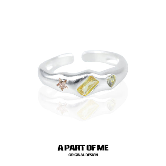 A PART OF ME rainbow star zircon ring with colorful gemstones in a unique design