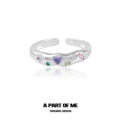 A PART OF ME rainbow zircon love ring with colorful gemstones set in a polished silver band