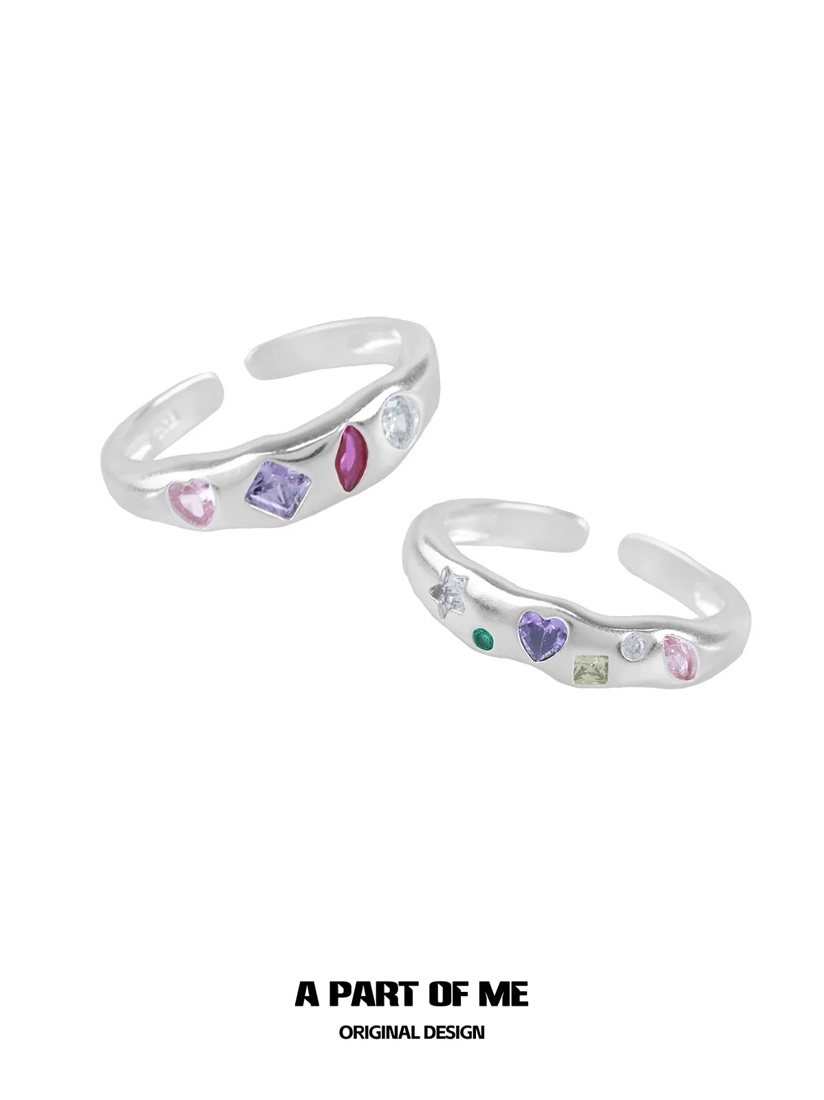 Two A PART OF ME rainbow zircon love rings with colorful gemstone accents in a unique design