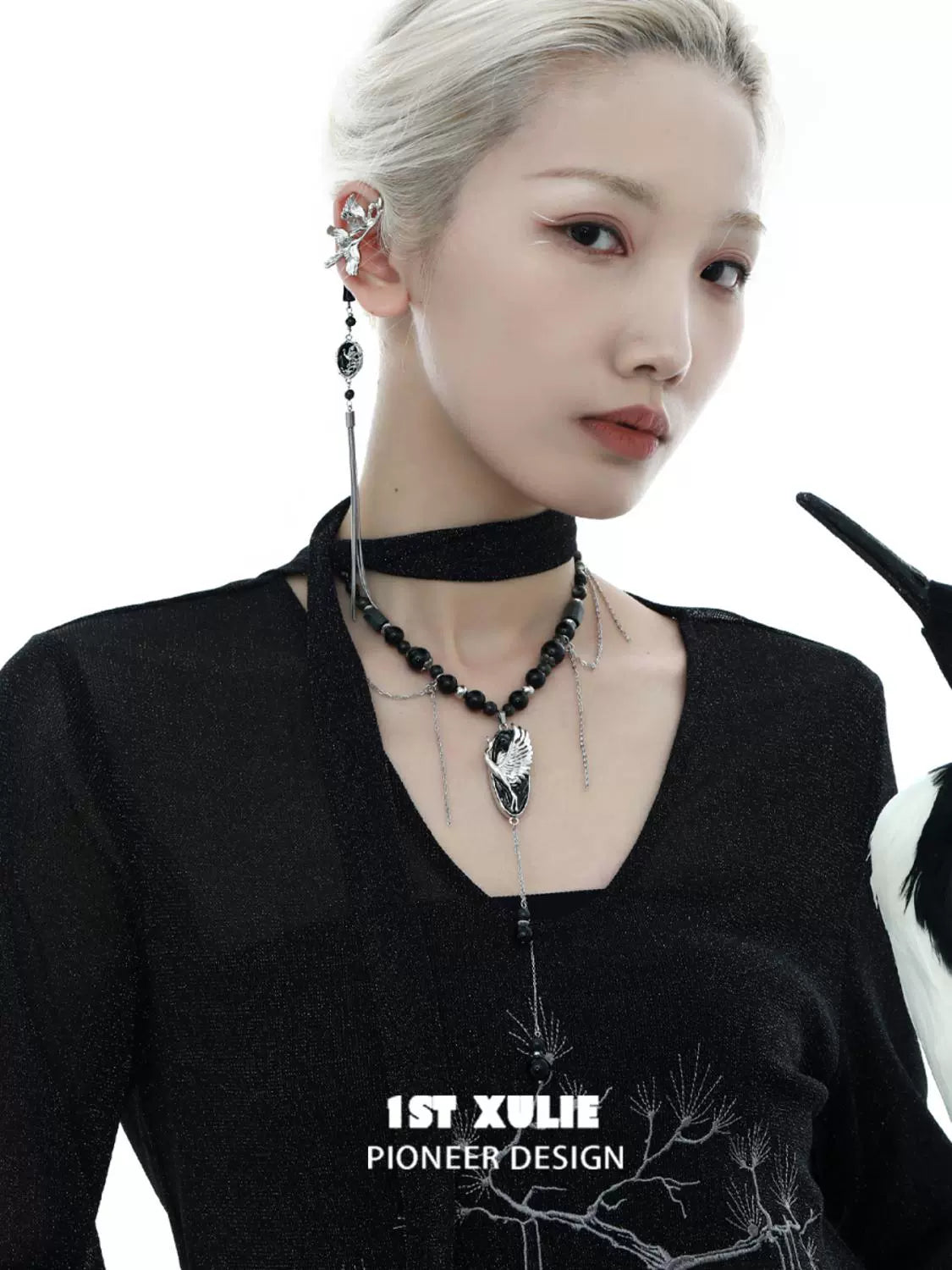 Rebellious crane tassel necklace featuring unique design with beads and elegant tassels
