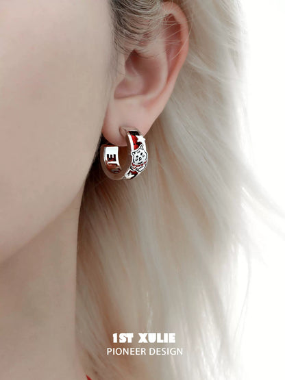 Stylish red puppy earrings made by 1STXULIE, perfect for animal lovers and trendy outfits