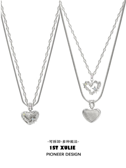 Silver removable clavicle chain necklace featuring two heart pendants, perfect for layering