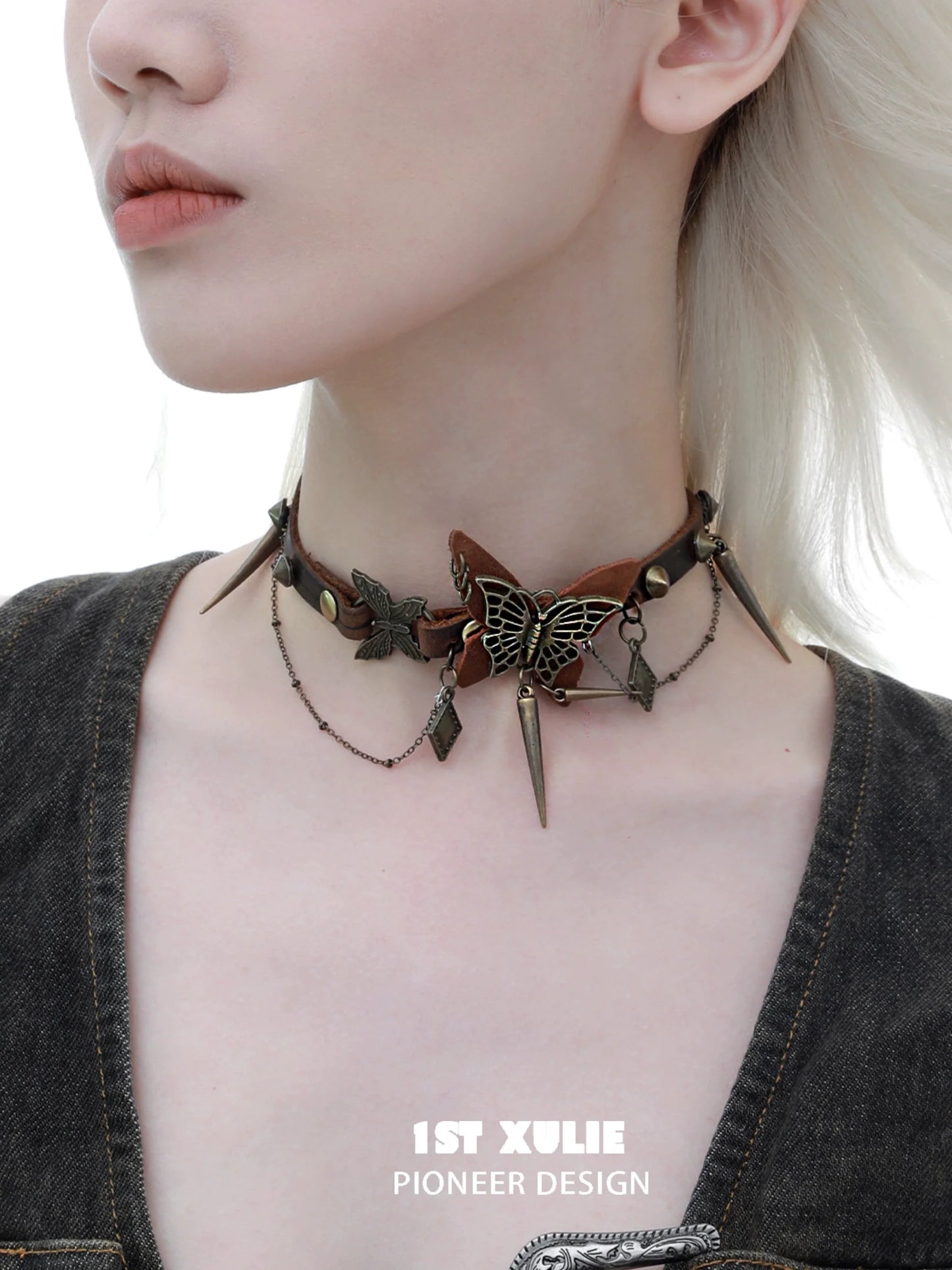 Retro butterfly choker by 1ST XULIE featuring ornate butterfly designs and chain accents