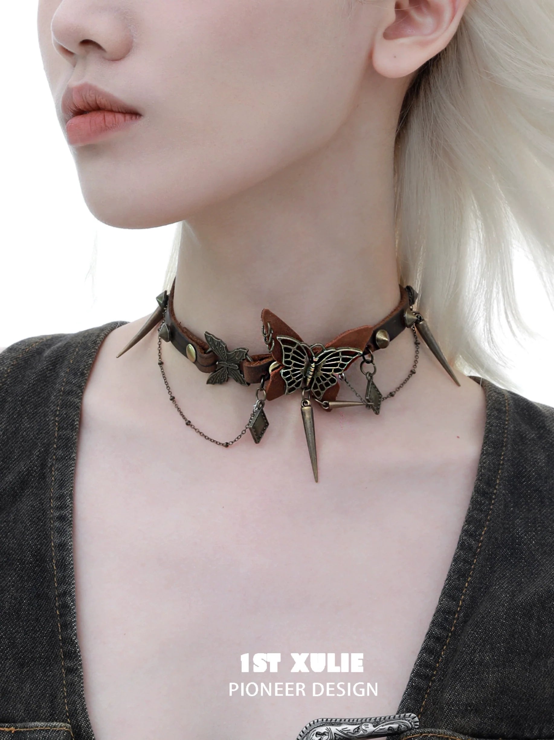 Retro butterfly choker by 1ST XULIE featuring ornate butterfly designs and chain accents