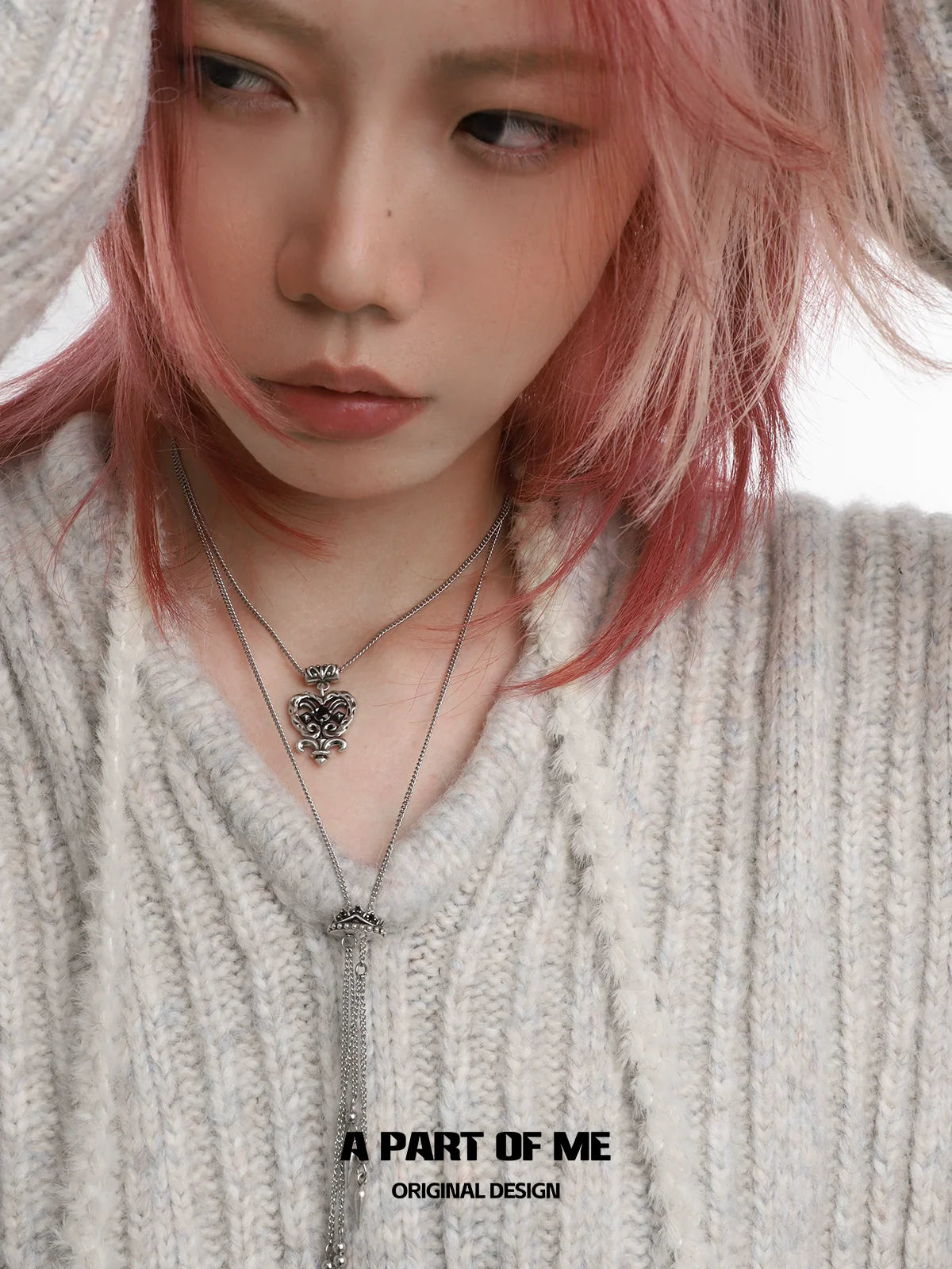 Model wearing a retro double-layer love necklace designed by A PART OF ME for a unique style