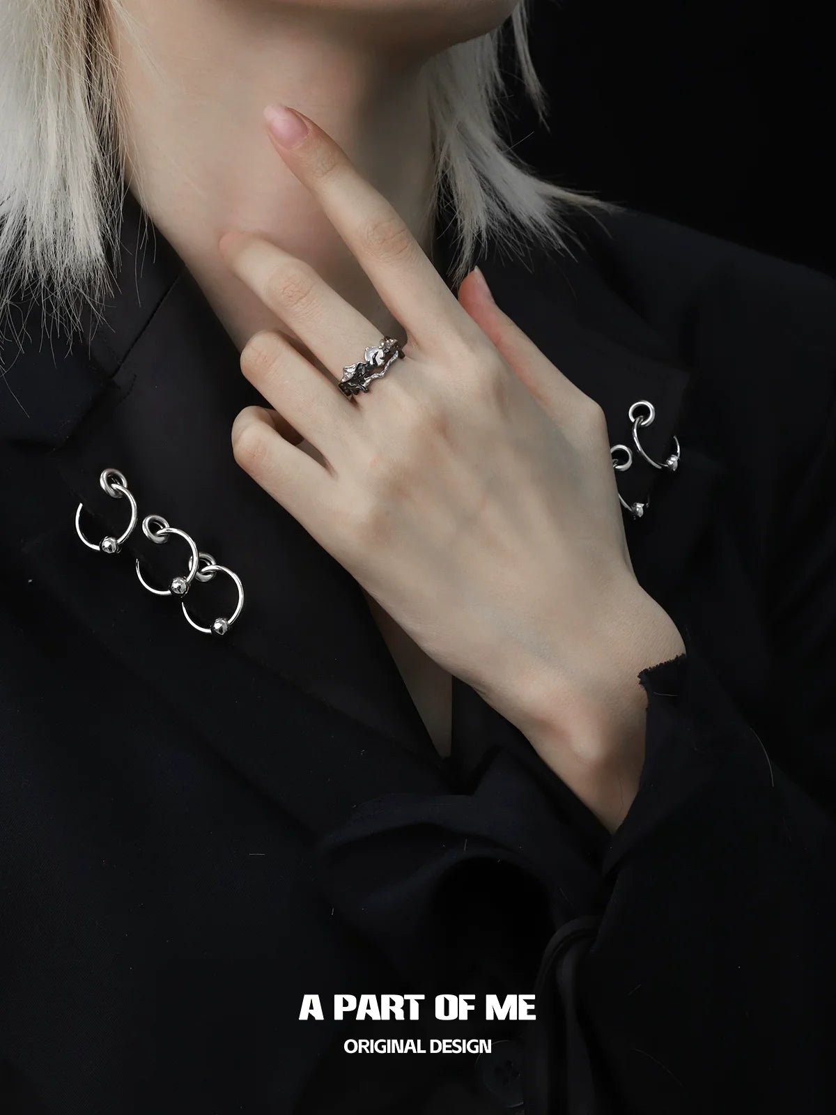 A PART OF ME sunrise moonset couple rings displayed on a hand with stylish black attire