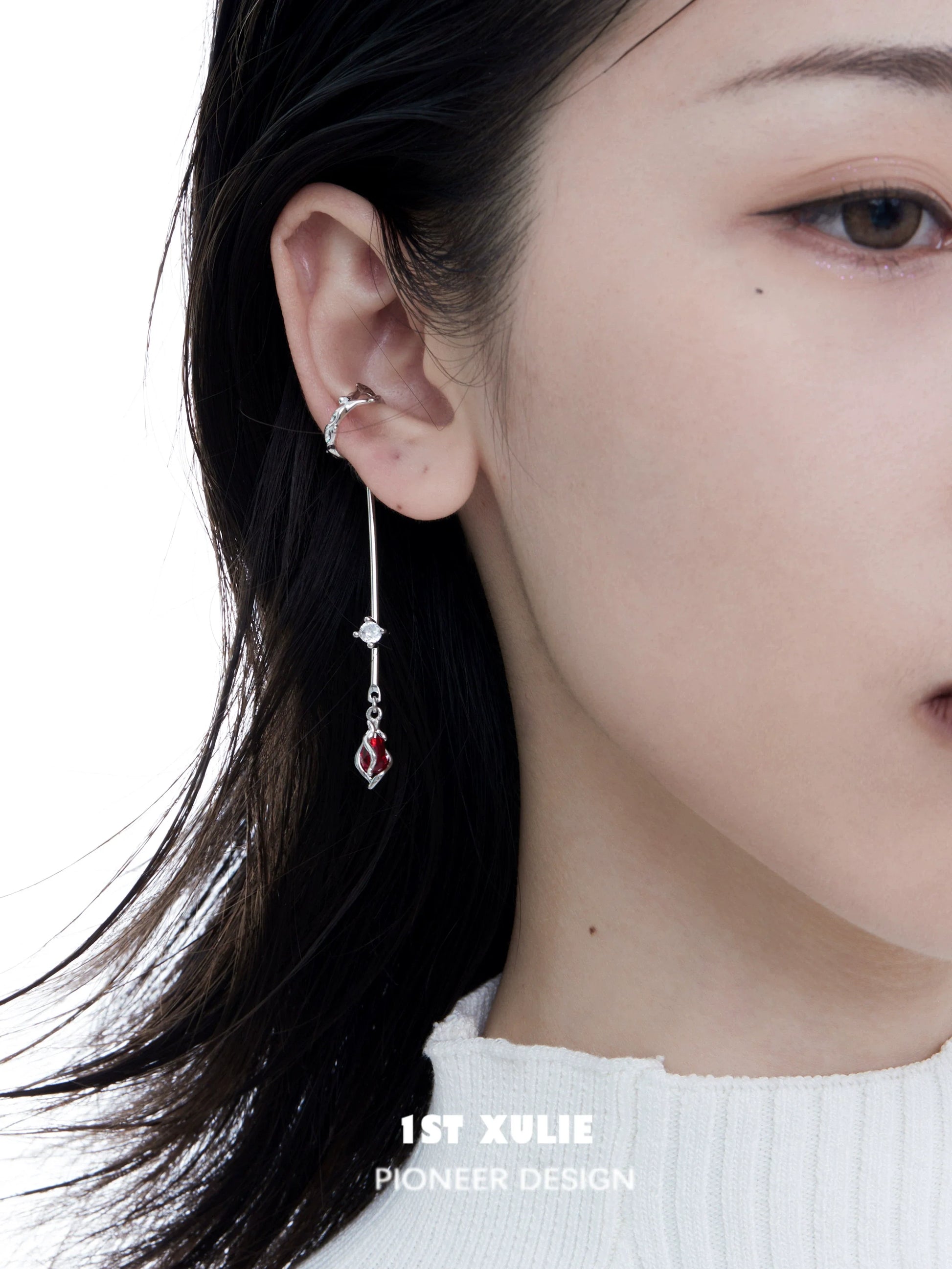 Elegant rose ear hangers with a delicate design featuring silver and red accents