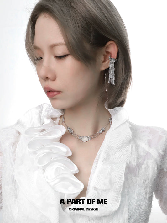 Rose silver necklace from A PART OF ME featured on a model with elegant styling