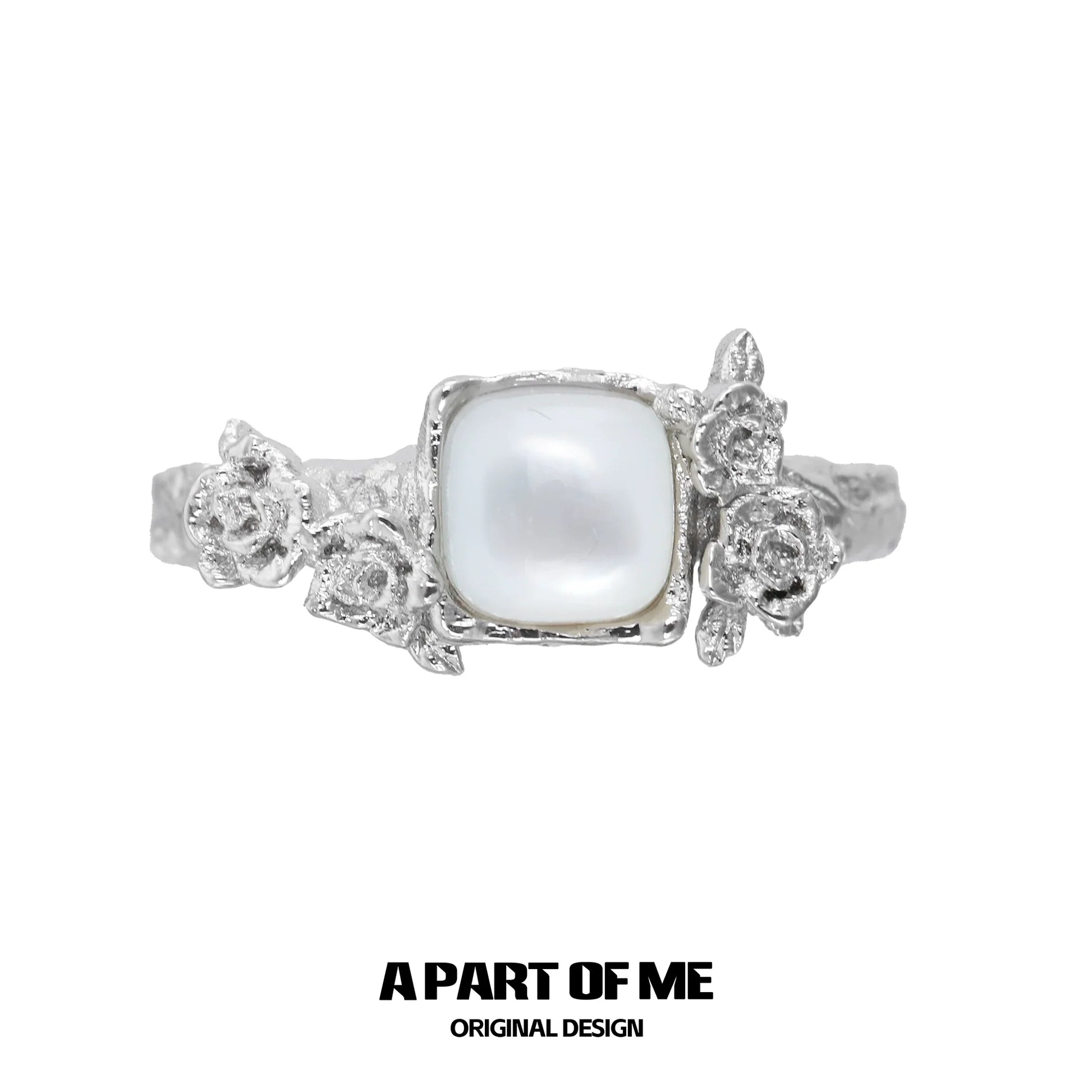 A Part of Me rose silver ring featuring a square pearl and detailed flower accents