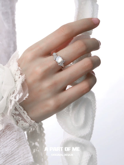 Delicate rose silver ring featuring a sparkling centerpiece, designed by A PART OF ME