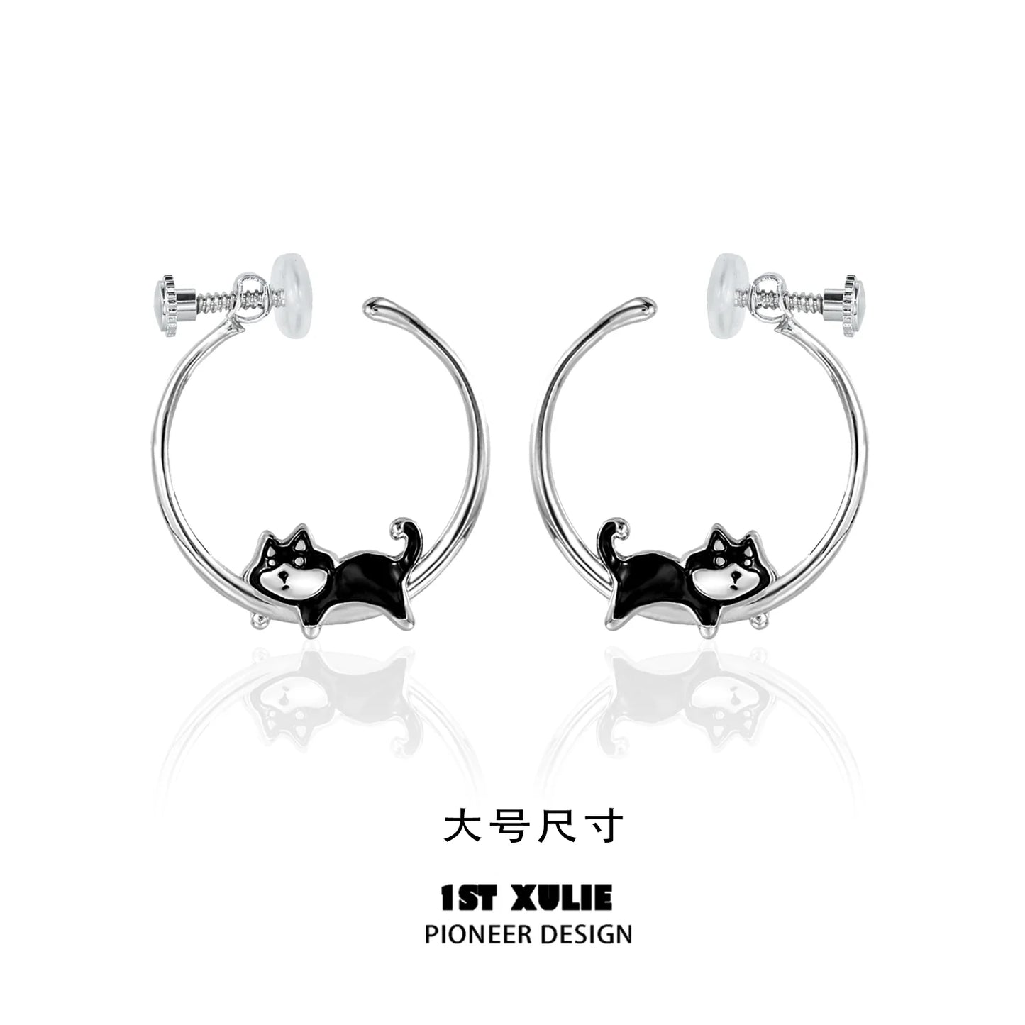 Cute running puppy earrings in silver featuring a playful dog design for animal lovers