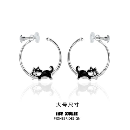 Cute running puppy earrings in silver featuring a playful dog design for animal lovers
