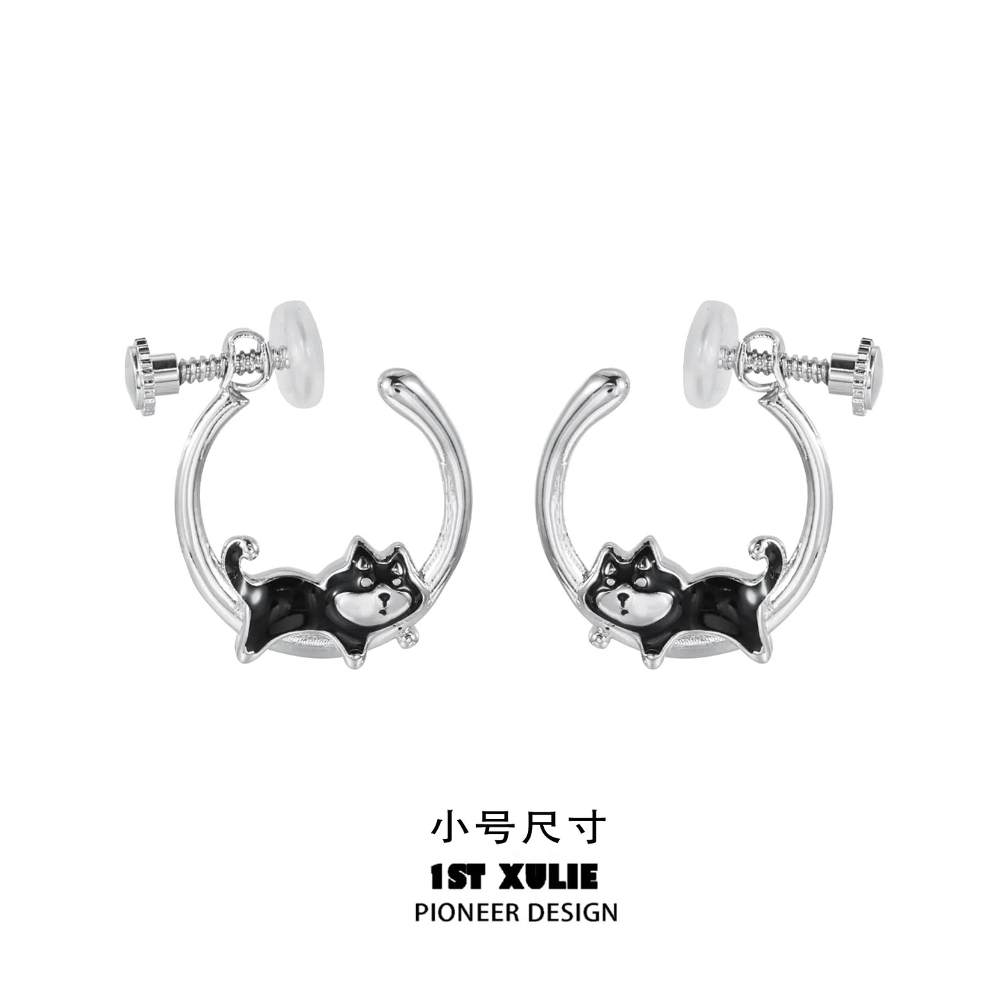 Sleek silver running puppy earrings featuring a playful design of a puppy in motion