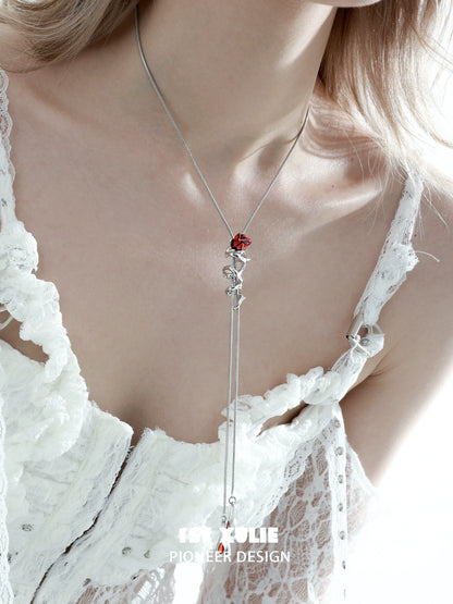Elegant silver scarlet rose clavicle chain necklace with a delicate design worn on a lace top