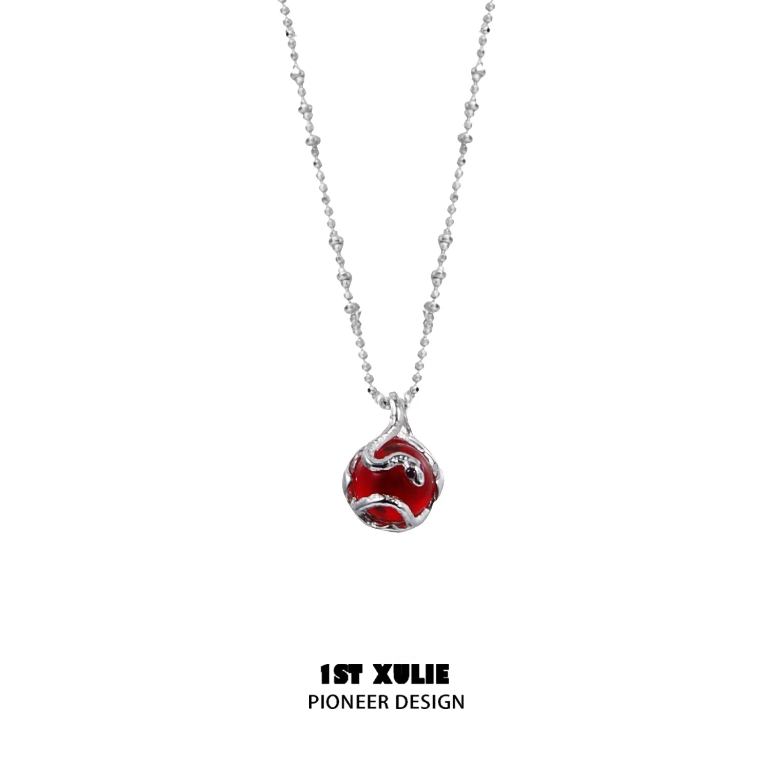 Serpent silver necklace with a unique red pendant design from 1STXULIE