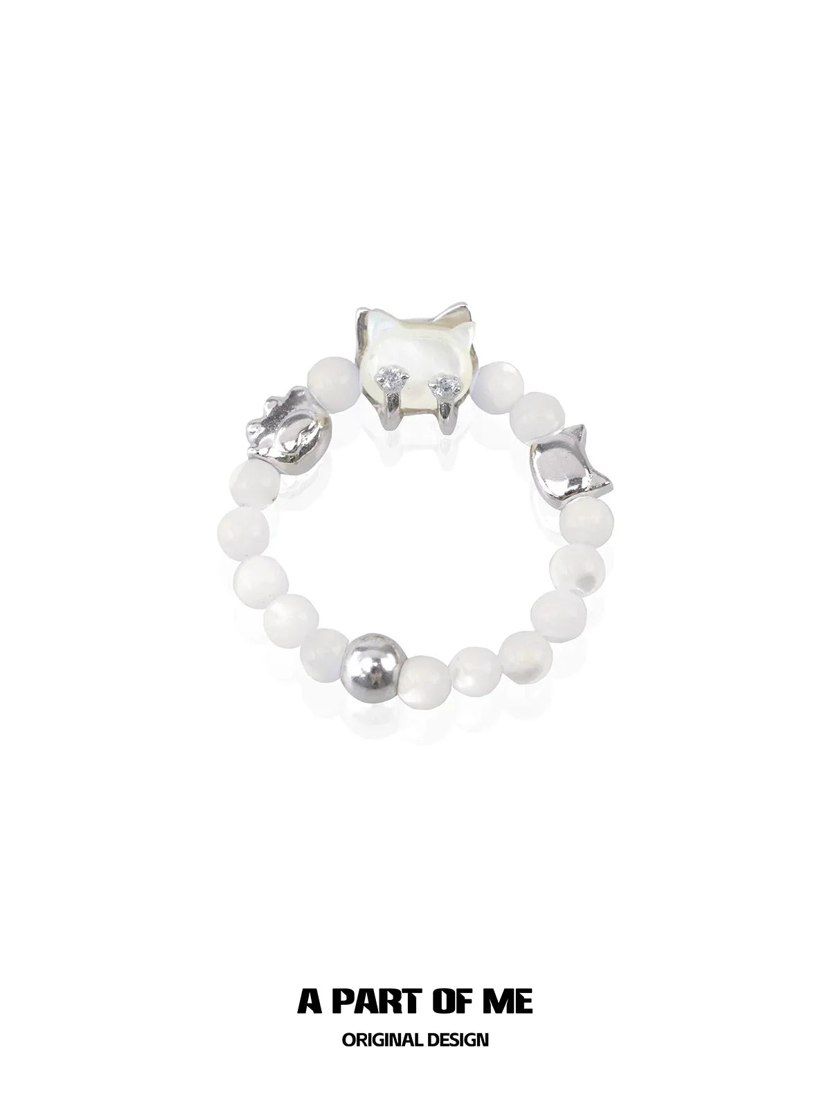 Stylish shell cat beaded ring featuring silver accents and white beads, perfect for unique accessories