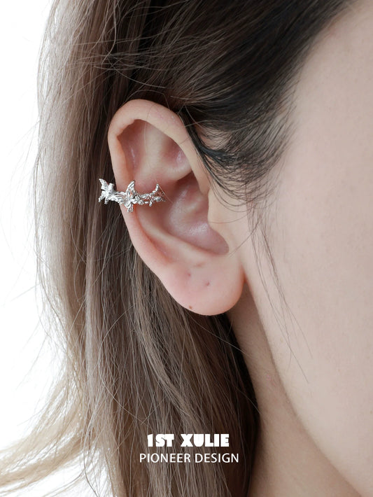 Silver butterfly ear cuff by 1STXULIE, featuring a delicate design that wraps around the ear