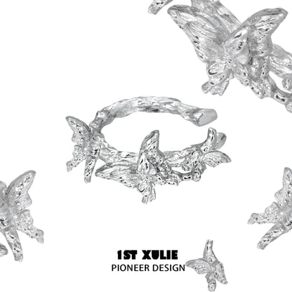 Elegant silver butterfly ear cuff featuring intricate butterfly and floral designs by 1ST XULIE