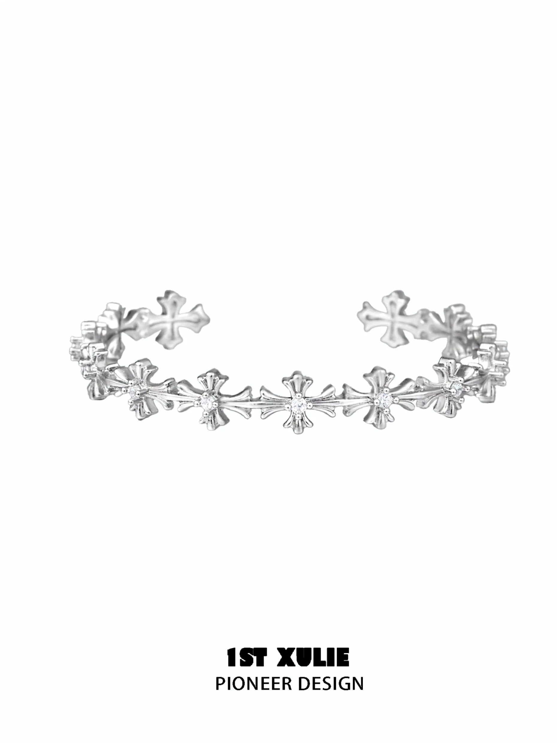 Elegant silver cross bracelet from 1STXULIE featuring a unique pioneer design