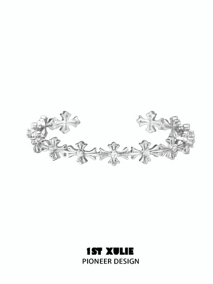 Elegant silver cross bracelet from 1STXULIE featuring a unique pioneer design