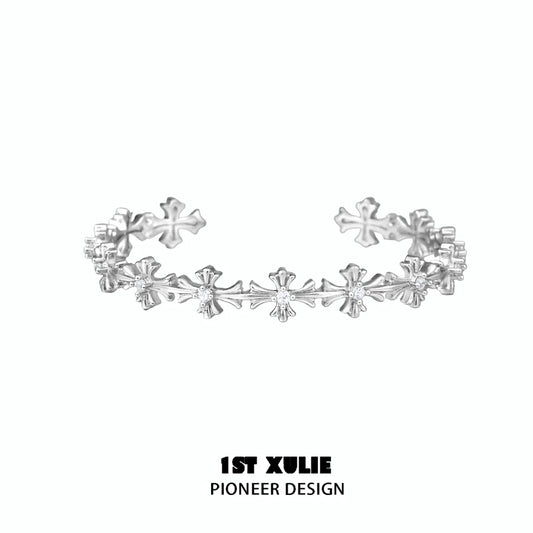 Stylish silver cross bracelet from 1STXULIE featuring intricate design for a modern look
